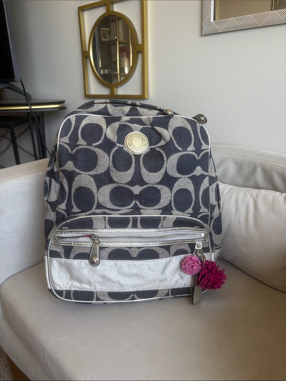 Coach Navy and Cream Signature Canvas Backpack with Pink Pom Charm